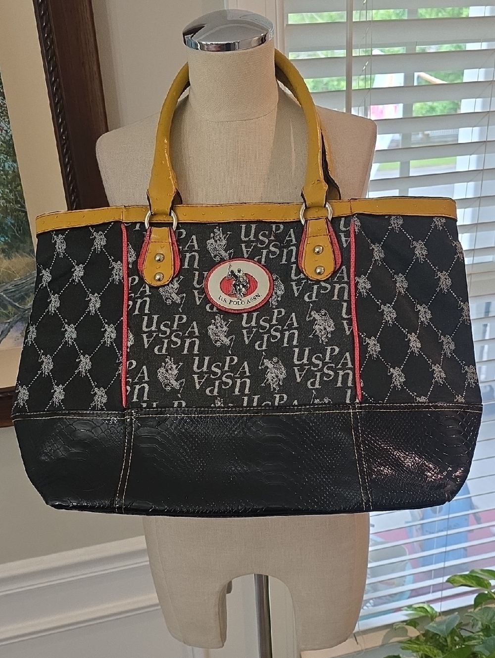U.S. Polo Assn. Black Shoulder Bag with Yellow Handles and Red Trim Accents